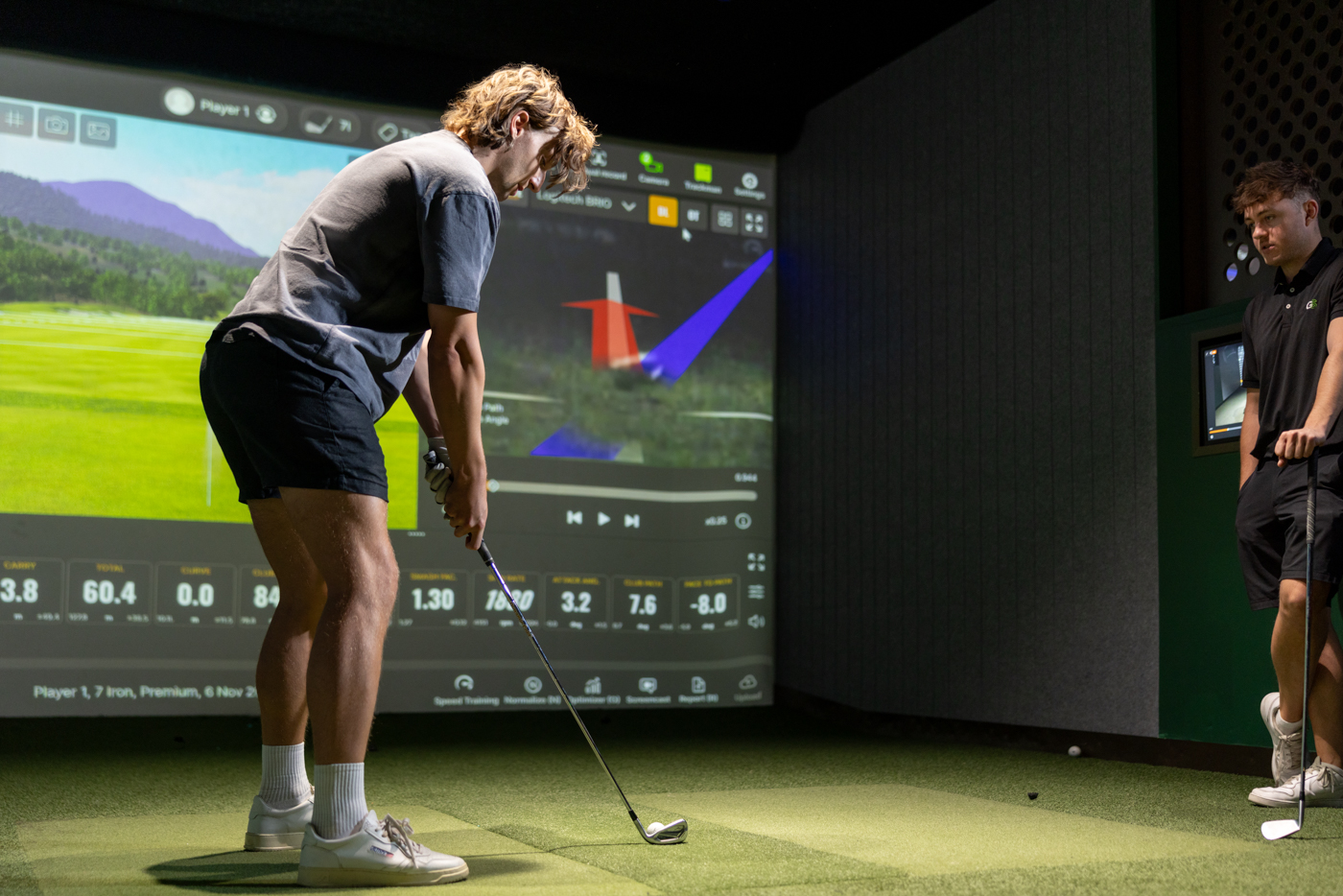 Golfer playing a short game shot.