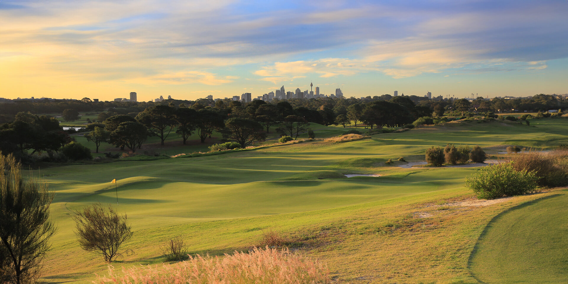 Bonnie Doon Golf Club fairway and green under a clear sky.
