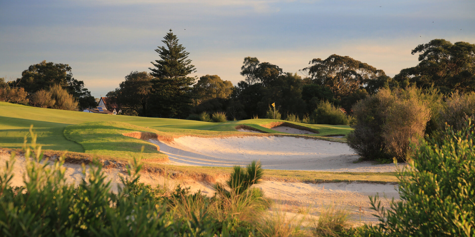 Bonnie Doon Golf Club course view with bunkers and undulating fairway.